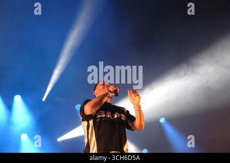 Jedburgh, UK. 31st Aug, 2025. Example performs onstage during day two of EdgeFest 2025 at Lilliardsedge near Jedburgh on August 30, 2025. EdgeFest 2025, Music Festival. A growing music festival, in the Scottish Borders, now in its third year, being held at Lilliardsedge, near Jedburgh. Music and entertainment for all the family, under the big top. ( Credit: Rob Gray/Alamy Live News Stock Photo