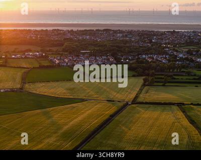Sunset over farm wheat fields, Meols, Wirral, Merseyside, England Stock Photo