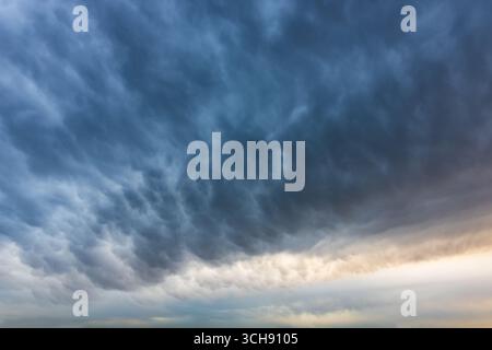 mammatus clouds. overcast sky with mammatus clouds at daytime. Stock Photo