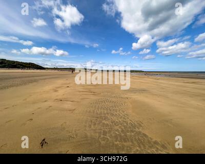 Beautiful view on the sandy Dunmoran beach with a nice blue sky and white clouds in Co, Sligo, Ireland Stock Photo