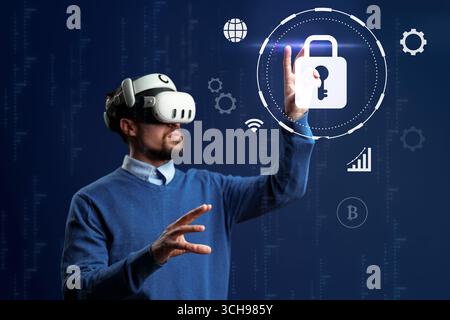 Virtual reality user interacts with digital security interface in a high-tech environment Stock Photo