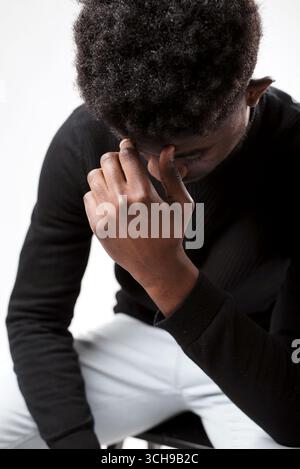 Close up of upset black man think about something Stock Photo