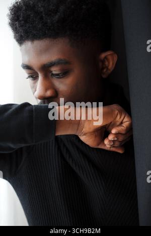 Cropped image of sad young black man Stock Photo