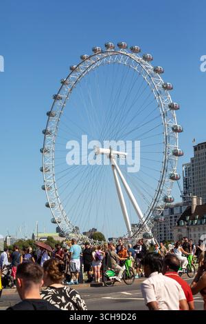 London Eye and Tourists, Westminster Bridge, London, UK Stock Photo