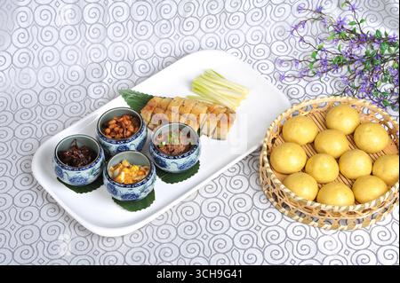 Northern Chinese Appetizer Platter with Shrimp Paste, Pickled Mackerel and Corn Wotou Stock Photo