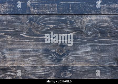 Rustic dark wooden boards with visible wood grain, natural texture and rough details, perfect for backgrounds, decorative surfaces and vintage designs Stock Photo