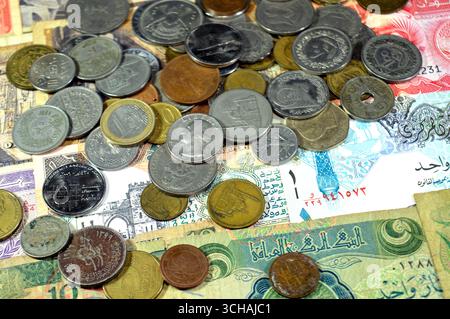 Background of various banknotes and coins of different countries of the world, of different times and values, vintage retro old cash money bills with Stock Photo