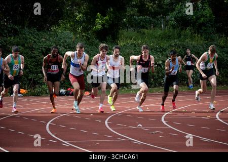 Athletics, runners at start of men`s 1500m race at club level, UK Stock ...