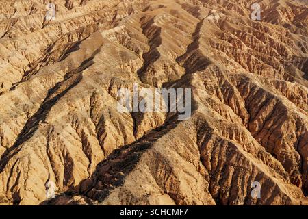 Desert Texture Pattern Aerial view of intricate sand textures and patterns formed by river ...