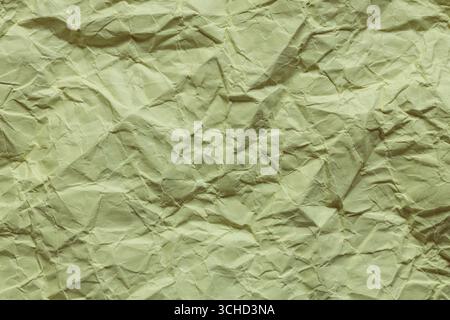 Minimal Grunge Texture of Crumpled Green Wrapping Paper Stock Photo