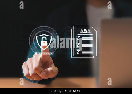 Cyber ​​security concept, businessman protecting personal data, passwords, accessing the internet safely. Stock Photo