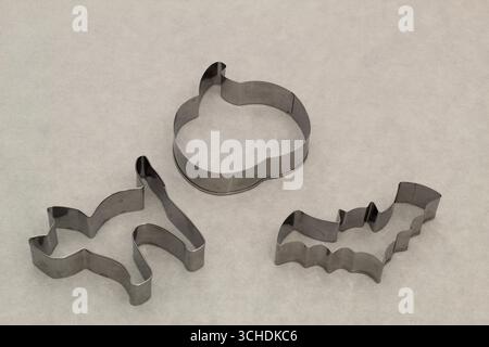 Halloween Cookie Cutters on Parchment Paper Stock Photo