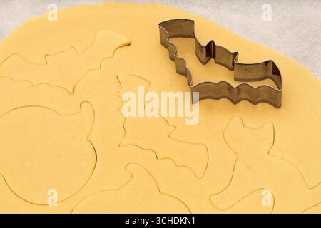 Halloween Bat Cookie Cutter on Cookie Dough Stock Photo