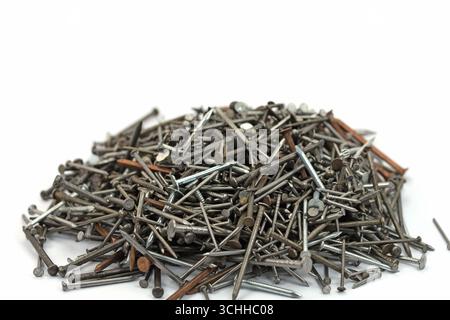 Many different nails against a white background Stock Photo