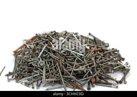 Many different nails against a white background Stock Photo