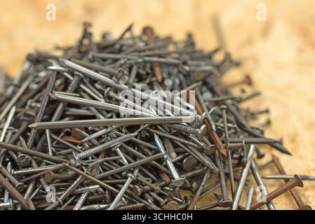 Many different nails against a white background Stock Photo