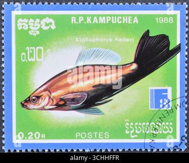 Cancelled postage stamp printed by Cambodia, that shows Green Swordtail (Xiphophorus helleri), International Stamp Exhibition FINLANDIA '88, Helsinki Stock Photo
