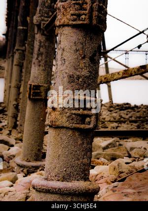 The decaying exterior of an abandoned building, part of the old Naval ...
