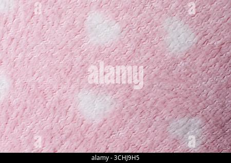 Smooth soft light pink wool fabric textile background used as cozy surface for modern fashion and decorative design concepts Stock Photo