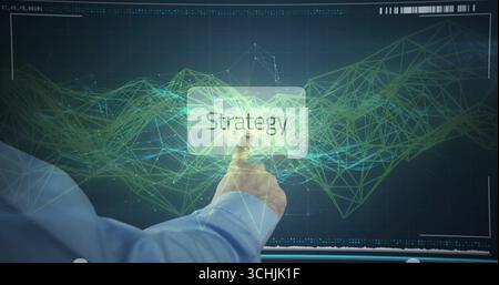 Interacting male hand in dress shirt touching Strategy button on screen in workspace, with network Stock Photo