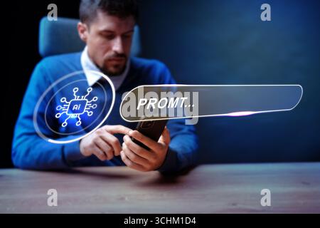 Man interacting with smartphone displaying AI features in a dimly lit workspace in the evening Stock Photo