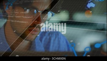 Analyzing data charts on monitor at office workstation with programming code overlay, copy space Stock Photo