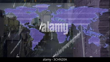 Projecting purple world map hologram displaying data inside warehouse, with cardboard stacks Stock Photo