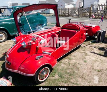 View of a Red, 1961, Messerschmitt KR200, with matching trailer, on display at the  on display at the Deal and Walmer Classic Car Show 2025 Stock Photo