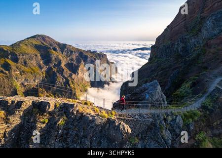 Aerial view of the mountains and trails leading to Pico Pico do Arieiro during a spring sunset. Madeira island, Portugal. Stock Photo