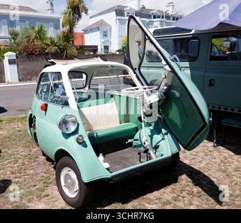 View of a  Green and White, 1960, BMW Isetta, Bubble Car, on display at the Deal and Walmer Classic Car Show, 2025 Stock Photo