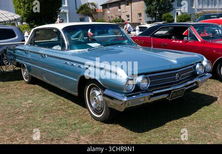 Three-quarters front view of a Blue, 1962 Buick Electra  225, on display at the Deal and Walmer Classic Car Show 2025. Stock Photo