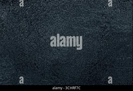 Dark and textured background providing a dramatic and atmospheric backdrop Stock Photo