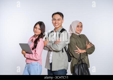 A Diverse Group of Young Professionals Collaborating Together in a Creative Workspace Stock Photo