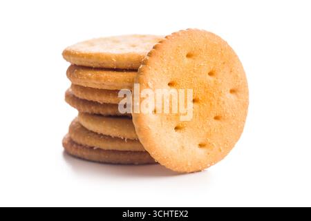 Crispy round salted crackers isolated on a white background. Stock Photo