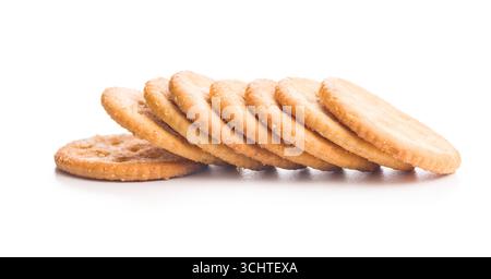 Crispy round salted crackers isolated on a white background. Stock Photo