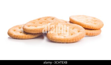 Crispy round salted crackers isolated on a white background. Stock Photo