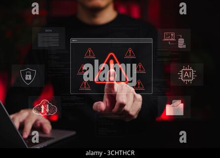 System Warning Alert for Cybersecurity Threat and AI Risk. Person interacting with red warning icon on digital screen surrounded by cyber security Stock Photo