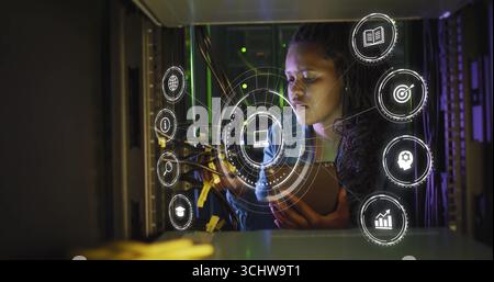 Managing network cables, technician examining connections in data center, with overlays, copy space Stock Photo