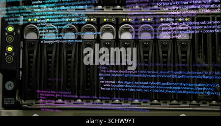 Displaying rack server storage unit processing data in data center, with status LEDs, code overlay Stock Photo