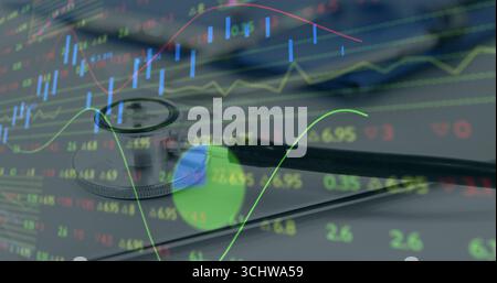 Resting stethoscope on pad displaying healthcare finance data at desk, with market graphs overlay Stock Photo