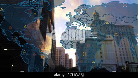 Showing city skyline at dusk under translucent world map overlay, with alert target and data icons Stock Photo