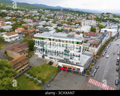 Modern buildings and streets with parked cars in a neighbourhood under a cloudy sky, aerial view, Telavi, Telavi, Kakheti region, Georgia Stock Photo