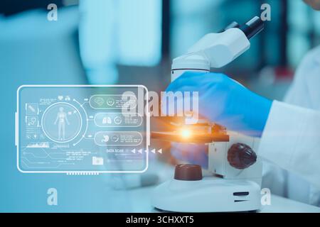 Scientist working at science lab microscope overlay hud showing drug and health information visual screen modern display research detail Stock Photo