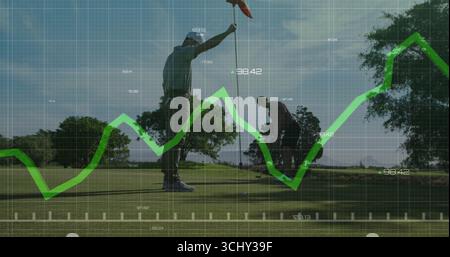 Aligning two golfers adjusting golf ball on putting green, with flagstick and data grid overlay Stock Photo