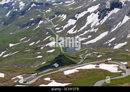 View from Edelweiss ridge to mountain pass Alpine pass Alpine mountain road Alpine road Pass road Pass road Pass old Grossglockner High Alpine Road Gr Stock Photo