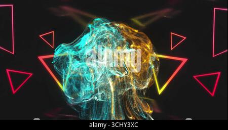 Swirling luminous teal and gold particle cloud flowing in black void, with neon-outlined triangles Stock Photo