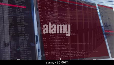 Displaying monitor showing red JavaScript code editor window in server room, with log viewer Stock Photo