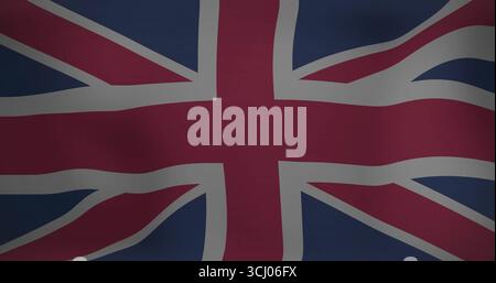 Displaying Union Jack flag filling frame on fabric backdrop, highlighting subtle texture and folds Stock Photo