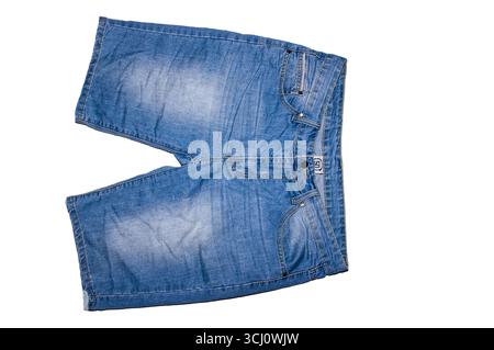 Blue denim shorts on a white background. Stock Photo