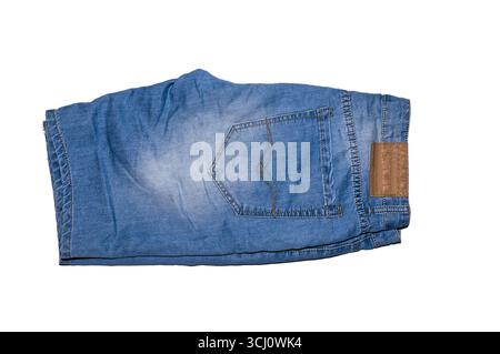 Blue denim shorts on a white background. Stock Photo